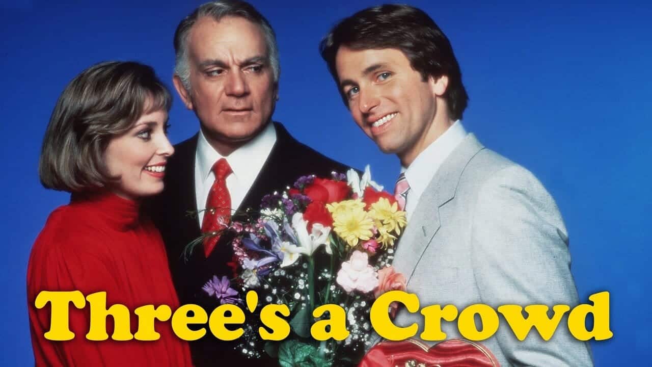 Main cast of "Three's a Crowd" posing with flowers, featuring John Ritter.